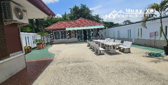 #1262   Development site on Huay Yai Main Road. Almost 3rai with existing pool villa.