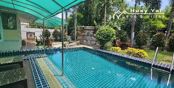 #1262   Development site on Huay Yai Main Road. Almost 3rai with existing pool villa.