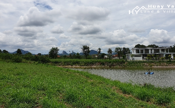 G29 Excellent value. Within Phoenix Golf. 1rai slightly sloping plot overlooking and adjoining a lake