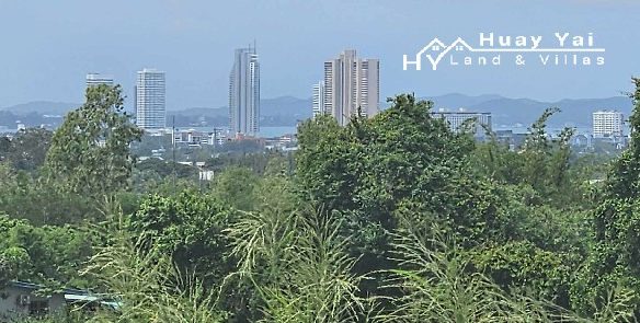 #1528   Quiet Hill Top walled land with good views to the city skyline, the ocean and also eastwards to Chak Nok Lake and beyond