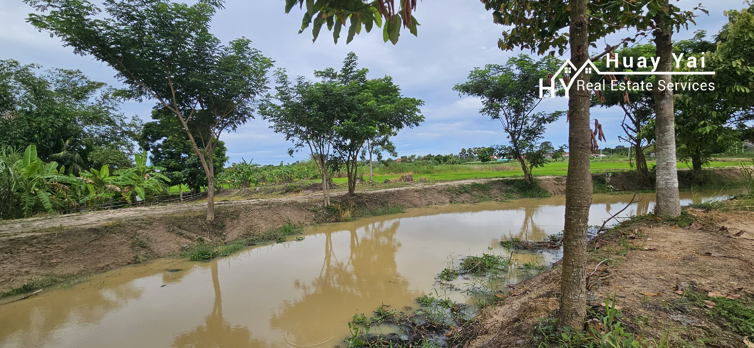 #1421  Beside a government klong.  Superb Value