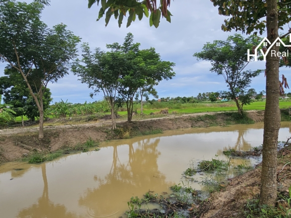 #1421  Beside a government klong.  Superb Value