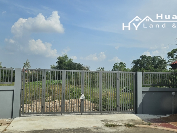 #1710 5rai adjoining gated community in centre of Huay Yai
