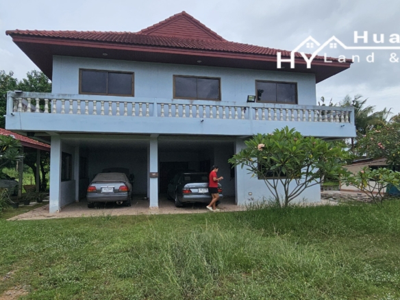 #3494        6+ rai large Thai House + 2nd house on main road.  Excellent Value