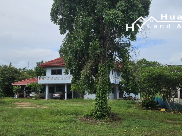 #3494        6+ rai large Thai House + 2nd house on main road.  Excellent Value