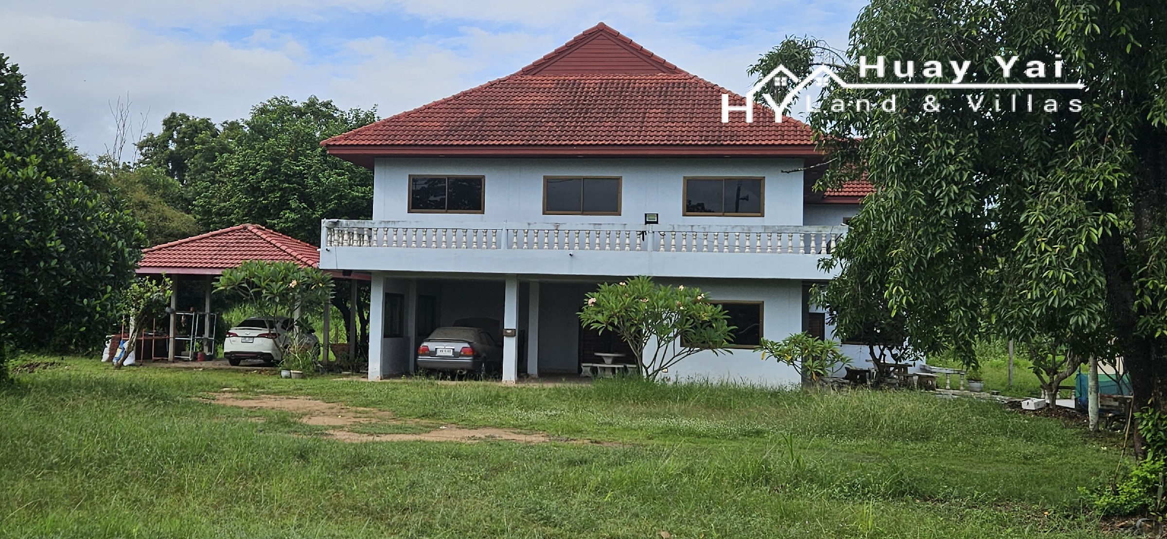 #3494        6+ rai large Thai House + 2nd house on main road.  Excellent Value