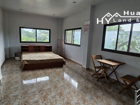 #3494        6+ rai large Thai House + 2nd house on main road.  Excellent Value