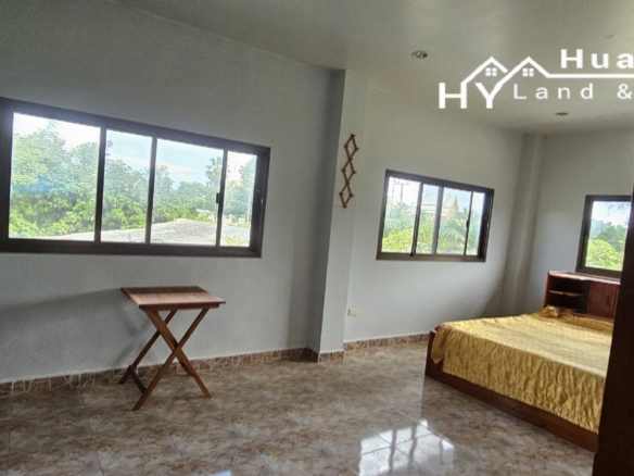 #3494        6+ rai large Thai House + 2nd house on main road.  Excellent Value