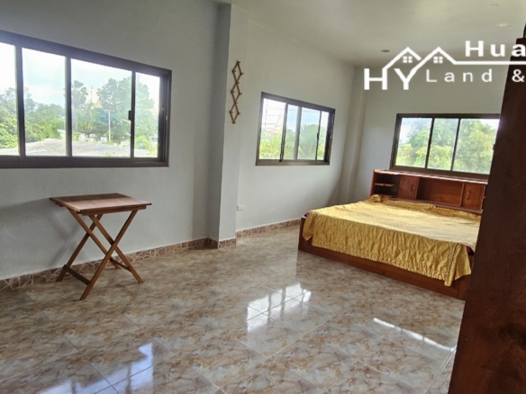 #3494        6+ rai large Thai House + 2nd house on main road.  Excellent Value
