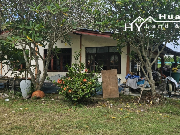 #3494        6+ rai large Thai House + 2nd house on main road.  Excellent Value