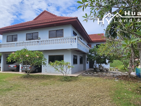 #3494        6+ rai large Thai House + 2nd house on main road.  Excellent Value