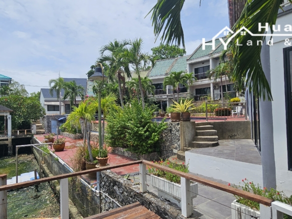 #3509   Attached split level house beside tidal canal in gated village