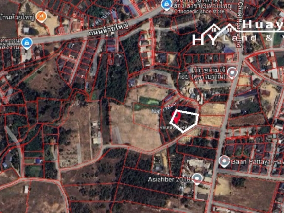#1749    Corner plot with wooden Thai house just off main road